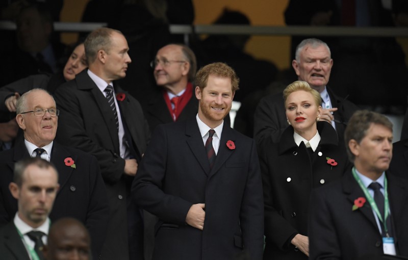 Britain Rugby Union - England v South Africa - 2016 Old Mutual Wealth Series - Twickenham Stadium, London, England - 12/11/16 Britain's prince Harry and Princess Charlene of Monaco look on from the stands before the match Reuters / Toby Melville