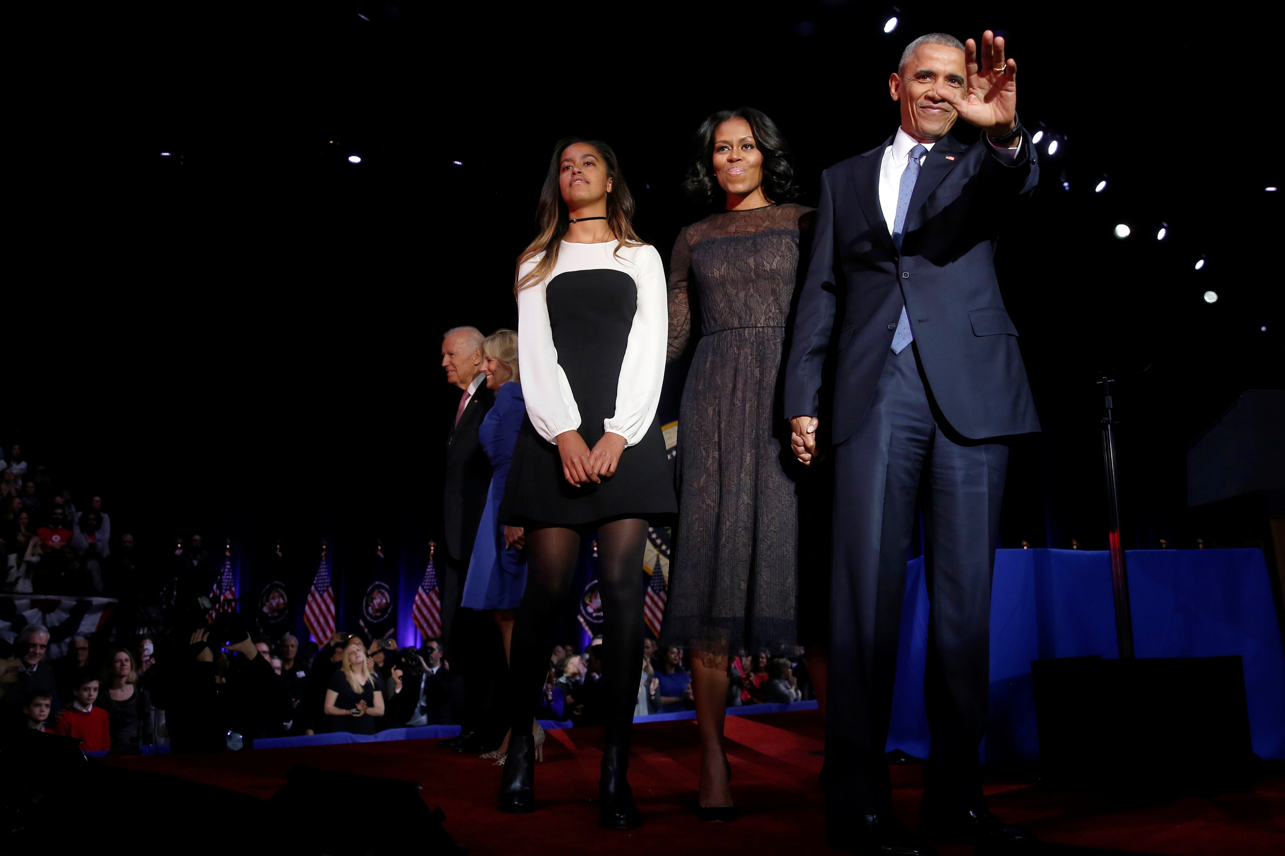 President Barack Obama is joined onstage by first lady Michelle Obama and daughter Malia, Vice President Joe Biden and his wife Jill Biden, after his farewell address in Chicago, Illinois. REUTERS/Jonathan Ernst