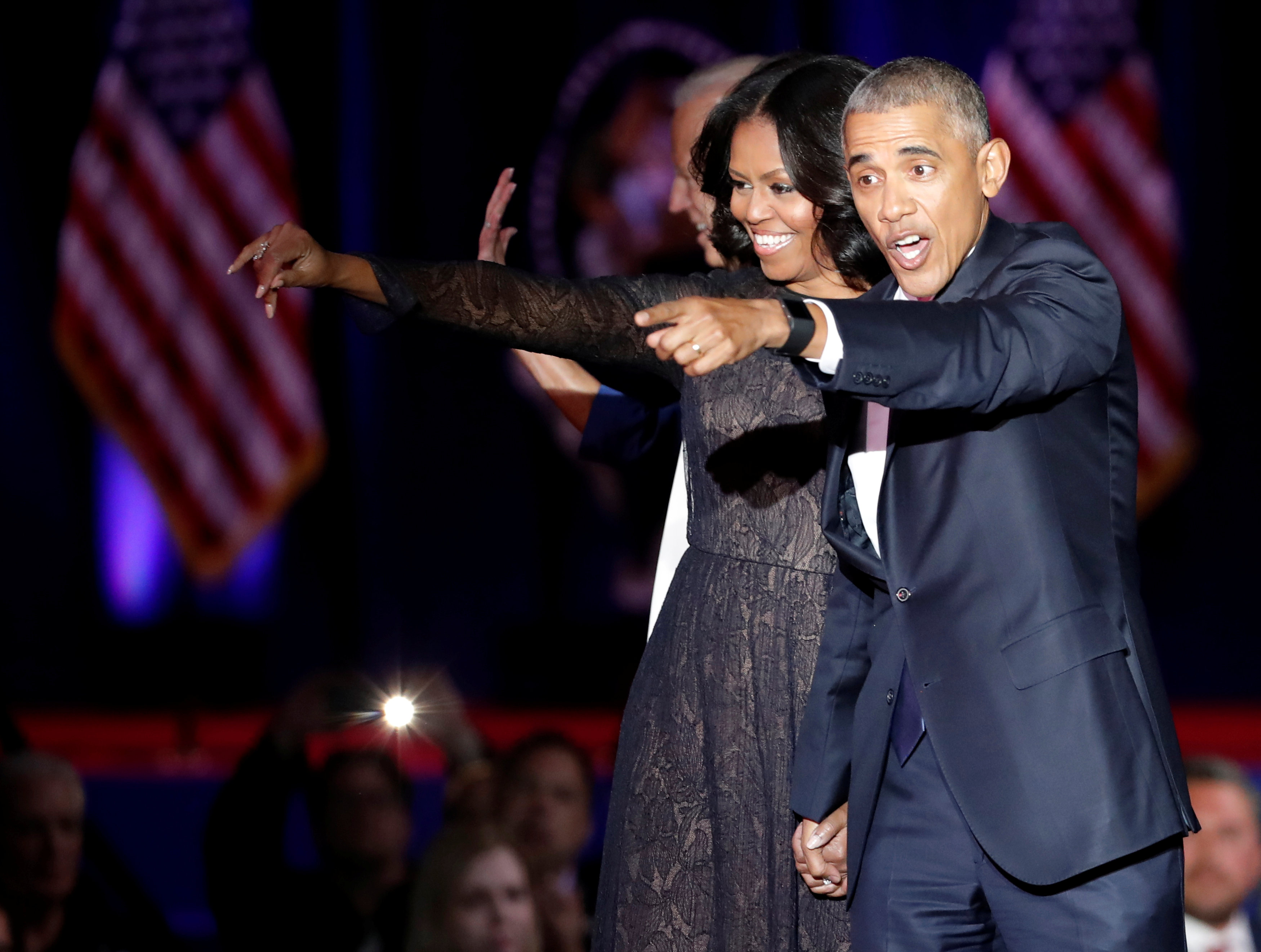 U.S. President Barack Obama and his wife Michelle acknowledge the crowd after President Obama delivered a farewell address at McCormick Place in Chicago, Illinois, U.S. January 10, 2017. REUTERS/John Gress