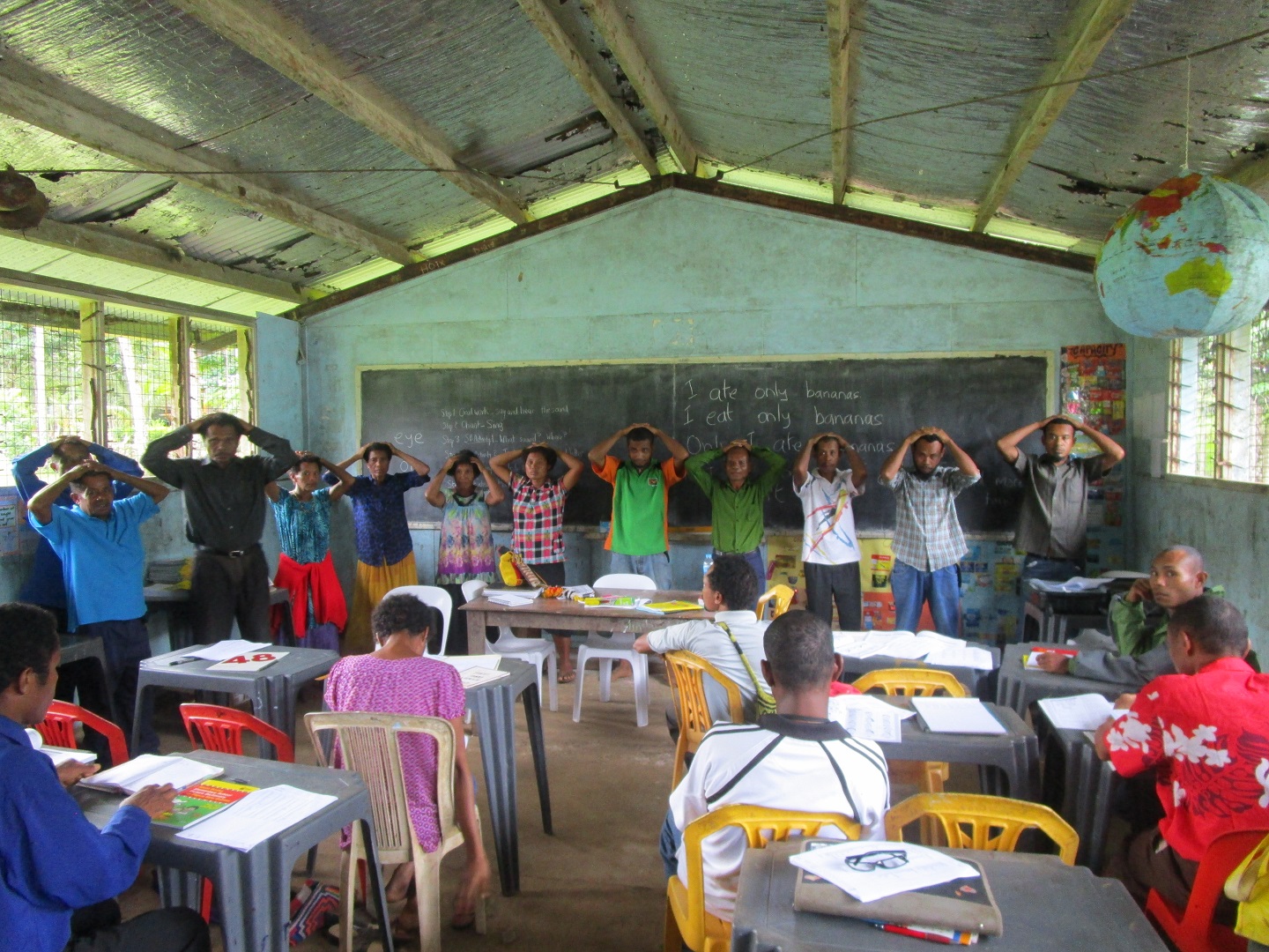 Teachers at Kitava PS do a demonstration lesson at the Bilum Books workshop on the new Standard Based Syllabus for Elementary Schools  