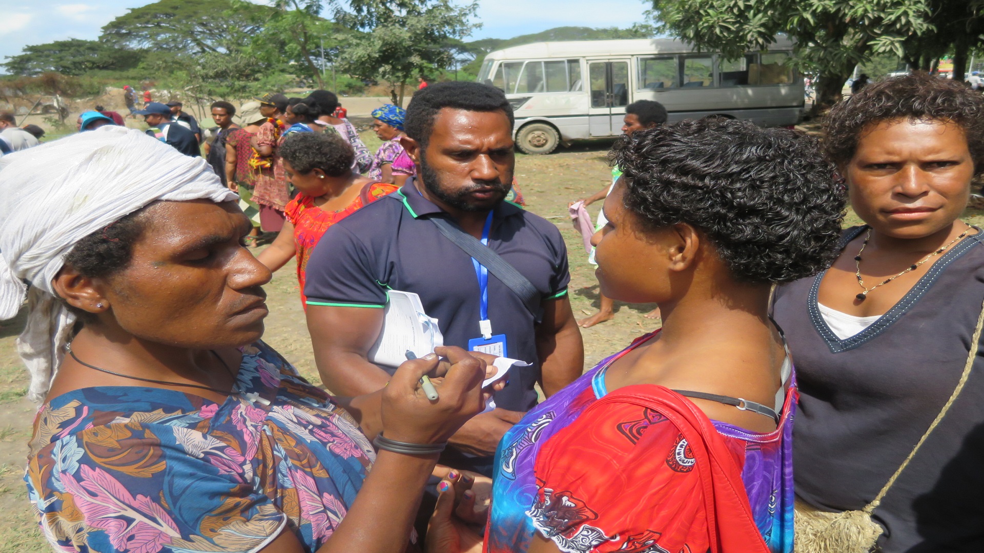 Voters discussing who to vote for at Waigani Police station