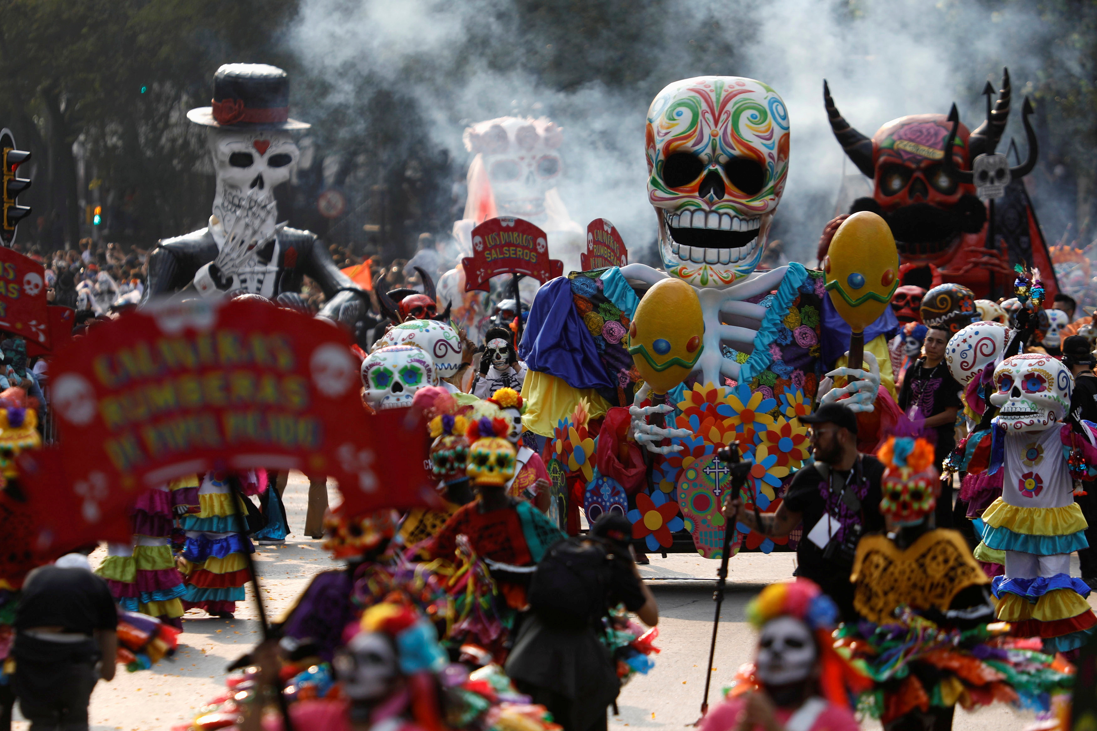 Skull figures are seen during a procession to commemorate Day of the Dead in Mexico City, Mexico, October 28, 2017. REUTERS/Edgard Garrido