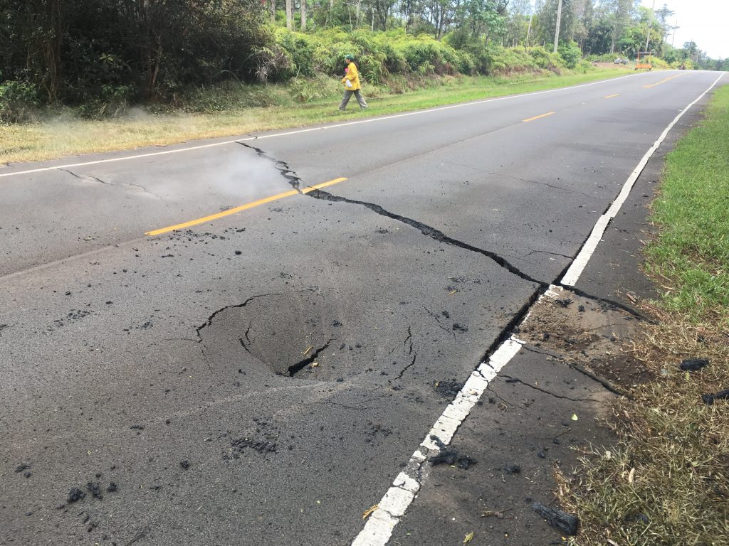 A crack opens up on Pohoiki Road, Lava near Leilani Estates, on Kilauea Volcano's lower East Rift Zone, Hawaii, the U.S., May 5, 2018. U.S. Geological Survey/Handout via REUTERS