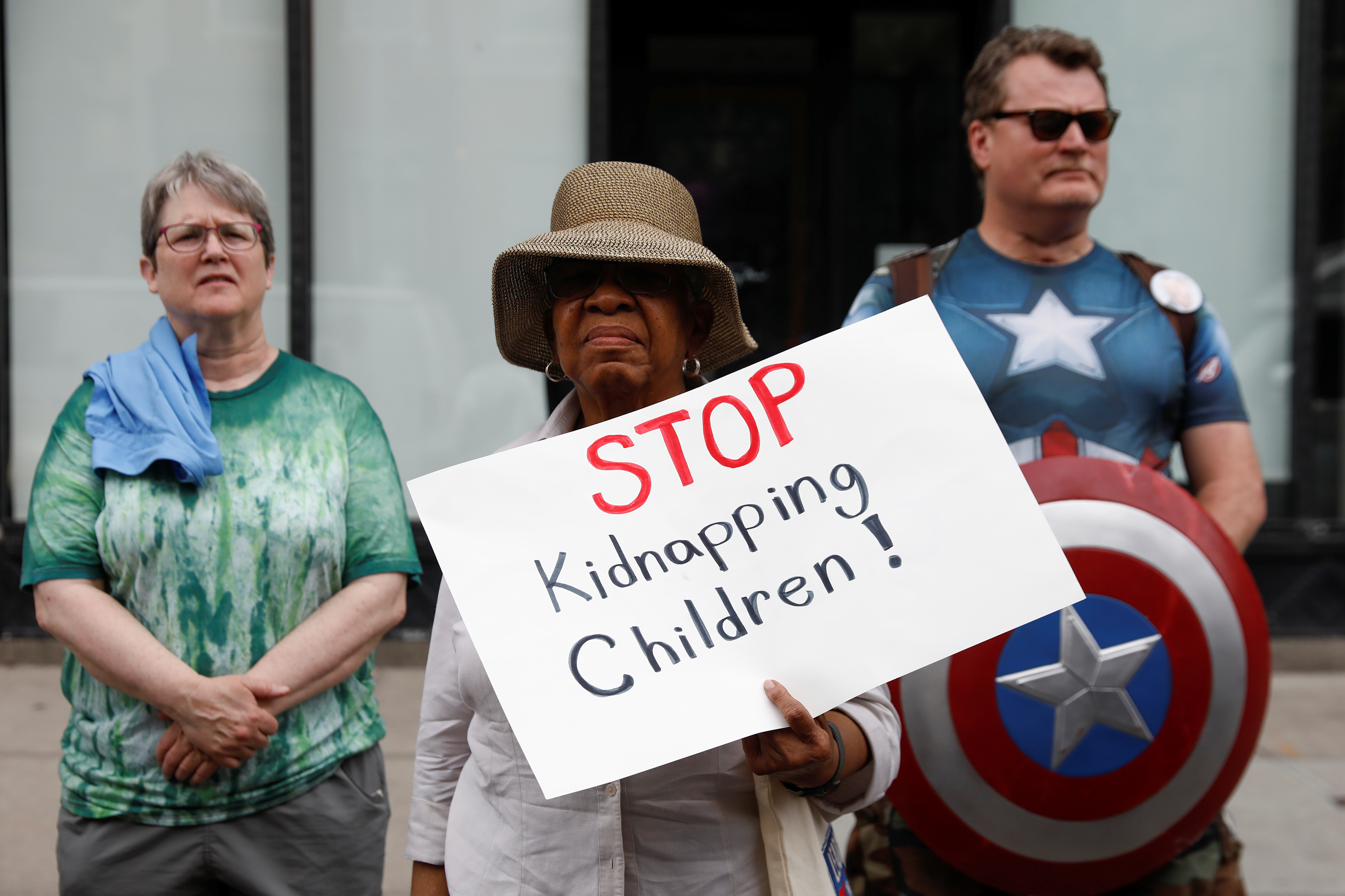 Demonstrators stand during a 'Close the Camps' rally to demand the closure of inhumane immigrant detention centers outside the Middle Collegiate Church in New York, U.S., July 2, 2019.  REUTERS/Shannon Stapleton